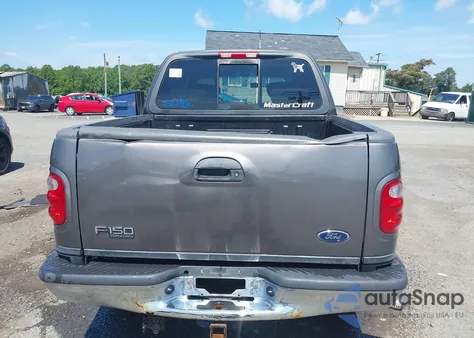 2002 Ford F-150 Lariat/Xlt из США, поврежденный, VIN 1FTRW08L32KE27250